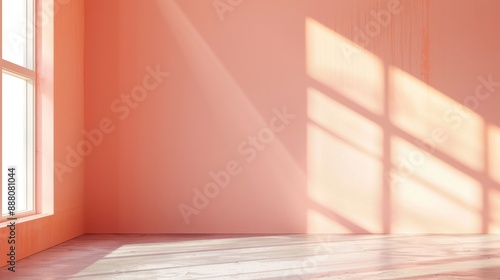 Peach colored empty room wall with minimal apricot background. Color of the year 2024 Peach Fuzz.