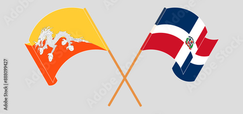 Crossed and waving flags of Bhutan and Dominican Republic
