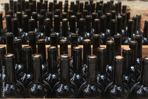 
Wine bottles aging in a Georgian cellar