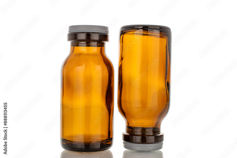 Two glass jars for medicine, macro, isolated on white background. Two glass jars for medicine, macro, isolated on white background.