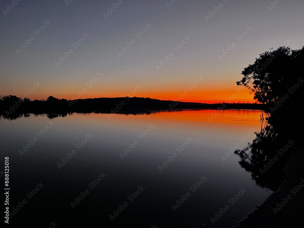 Naklejka premium sunset on the river