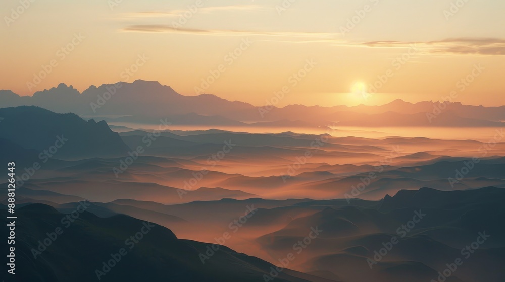 Wide shot of a mountain range at sunrise. 