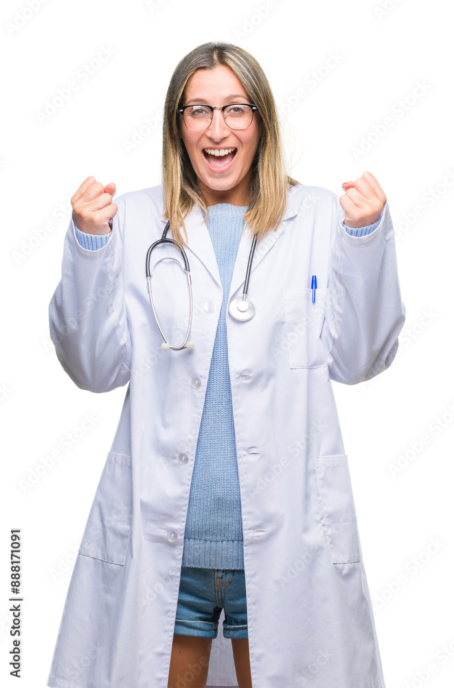 Young beautiful doctor woman headphones over isolated background celebrating surprised and amazed for success with arms raised and open eyes. Winner concept. Young beautiful doctor woman headphones over isolated background celebrating surprised and amazed for success with arms raised and open eyes. Winner concept.