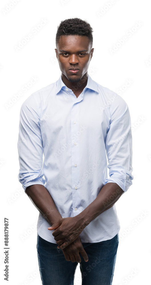 Fototapeta premium Young african american man wearing a shirt with a confident expression on smart face thinking serious
