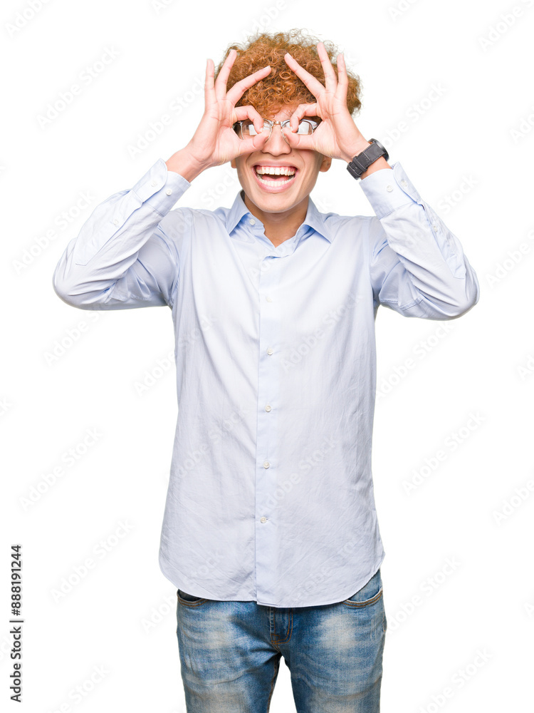 Young handsome business man with afro wearing glasses doing ok gesture like binoculars sticking tongue out, eyes looking through fingers. Crazy expression. Young handsome business man with afro wearing glasses doing ok gesture like binoculars sticking tongue out, eyes looking through fingers. Crazy expression.