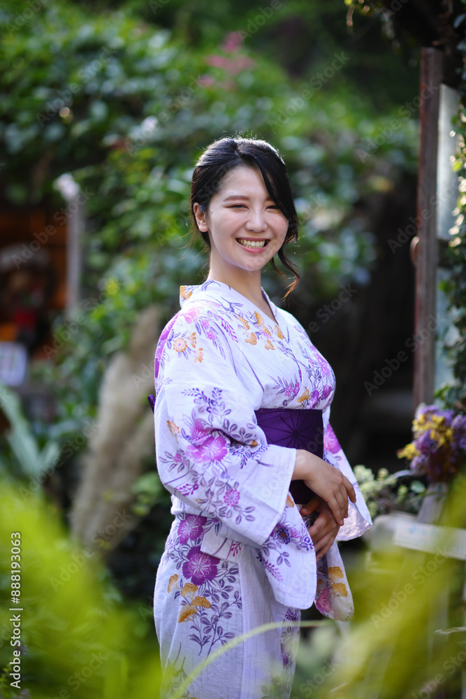 portrait woman with yukata dress in the garden portrait woman with yukata dress in the garden