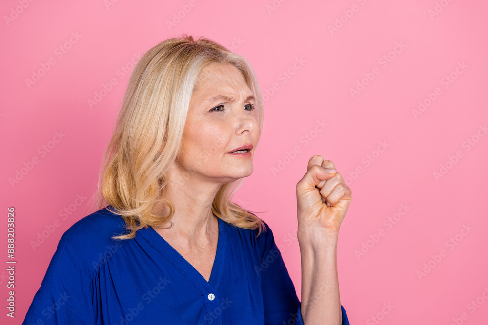 Photo portrait of pretty senior female cough flu cold wear trendy blue outfit isolated on pink color background Photo portrait of pretty senior female cough flu cold wear trendy blue outfit isolated on pink color background