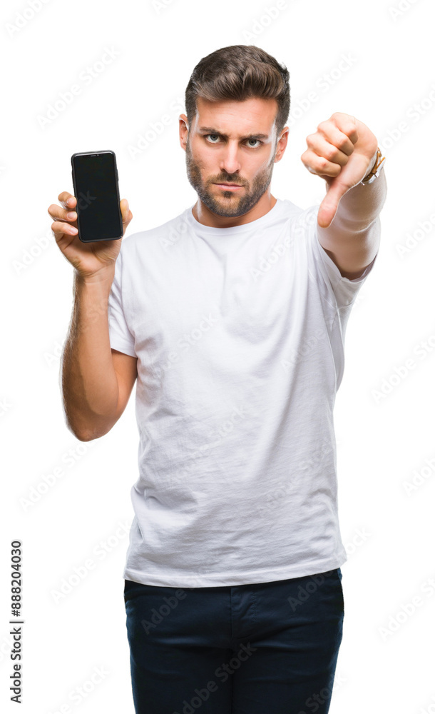 Young handsome man showing smartphone screen over isolated background with angry face, negative sign showing dislike with thumbs down, rejection concept Young handsome man showing smartphone screen over isolated background with angry face, negative sign showing dislike with thumbs down, rejection concept