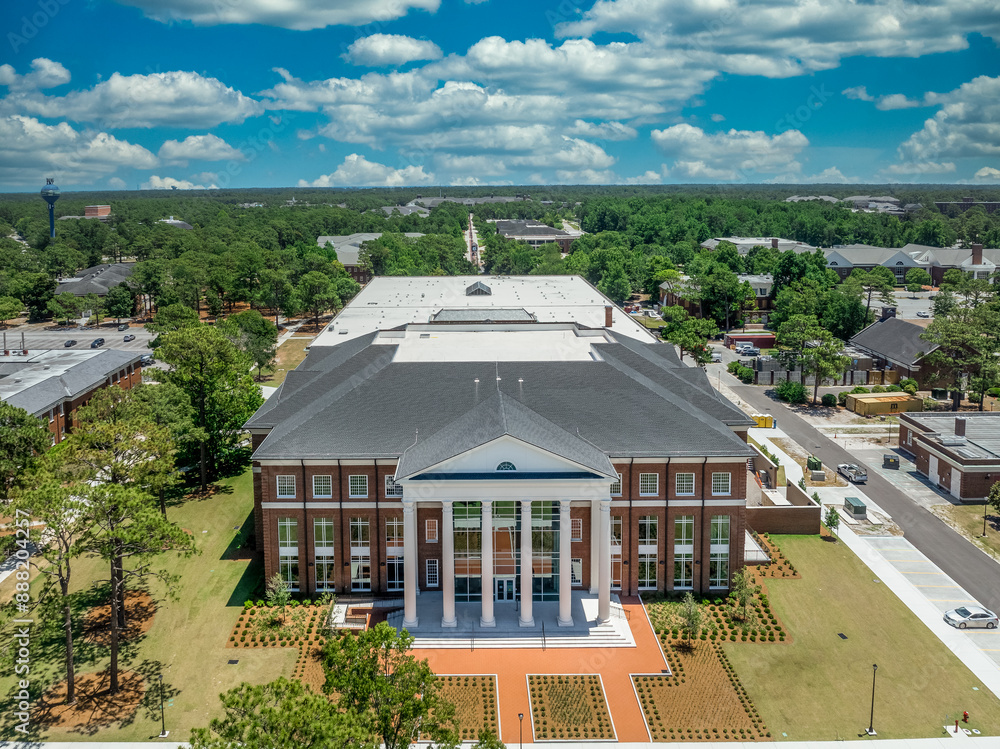 Aerial view of University of North Carolina at Wilmington Randall Library classicist entrance with white column brick facade