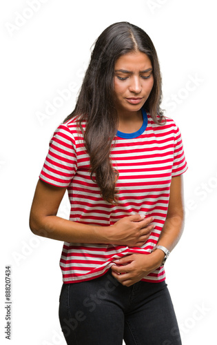 Young beautiful arab woman over isolated background with hand on stomach because nausea, painful disease feeling unwell. Ache concept.