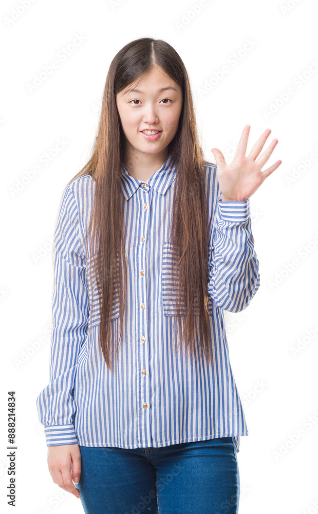 Young Chinese woman over isolated background showing and pointing up with fingers number five while smiling confident and happy. Young Chinese woman over isolated background showing and pointing up with fingers number five while smiling confident and happy.