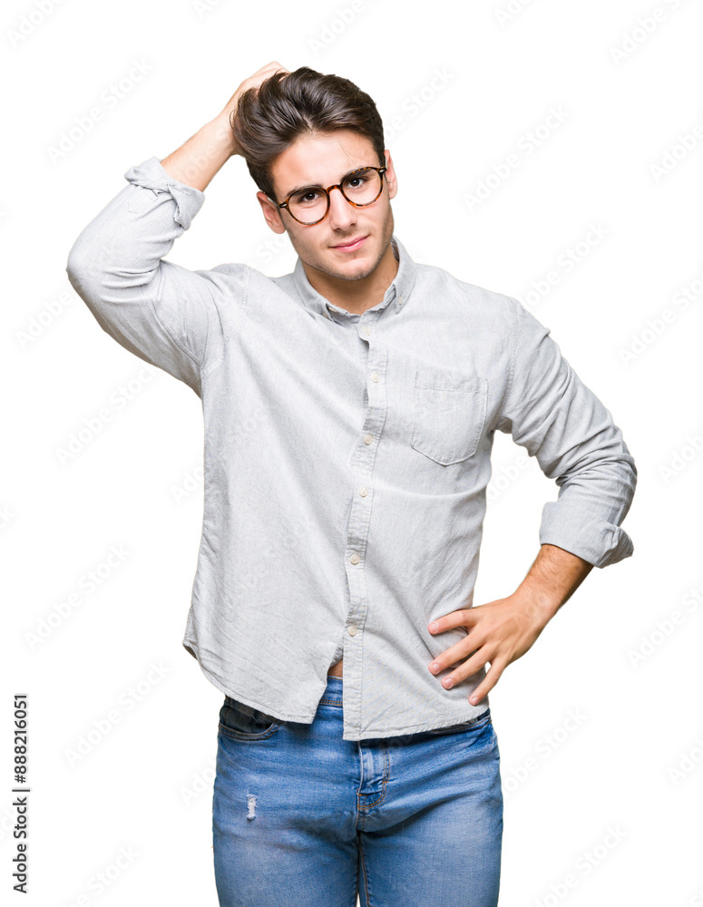 Young handsome man wearing glasses over isolated background confuse and wonder about question. Uncertain with doubt, thinking with hand on head. Pensive concept. Young handsome man wearing glasses over isolated background confuse and wonder about question. Uncertain with doubt, thinking with hand on head. Pensive concept.