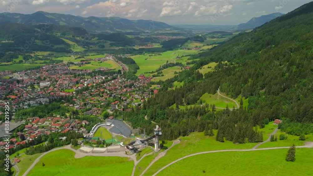 Aerial view of Obersdorf, Bavaria, Germany in summer. Oberstdorf, Markt in Bayern Deutschland Luftaufnahme im Sommer. Urlaub in Oberstdorf im Allgau. Hiking village and winter sports resort in Alps. Aerial view of Obersdorf, Bavaria, Germany in summer. Oberstdorf, Markt in Bayern Deutschland Luftaufnahme im Sommer. Urlaub in Oberstdorf im Allgau. Hiking village and winter sports resort in Alps.