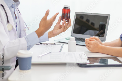 A young woman sought medical advice after becoming ill and had the doctor examine her body and give advice on health care and prescribe medication to treat her symptoms. medical consultant concept