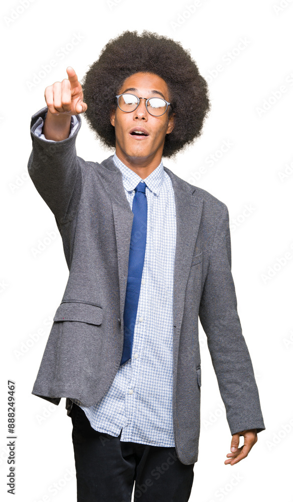Young african american business man with afro hair wearing glasses Pointing with finger surprised ahead, open mouth amazed expression, something in front Young african american business man with afro hair wearing glasses Pointing with finger surprised ahead, open mouth amazed expression, something in front