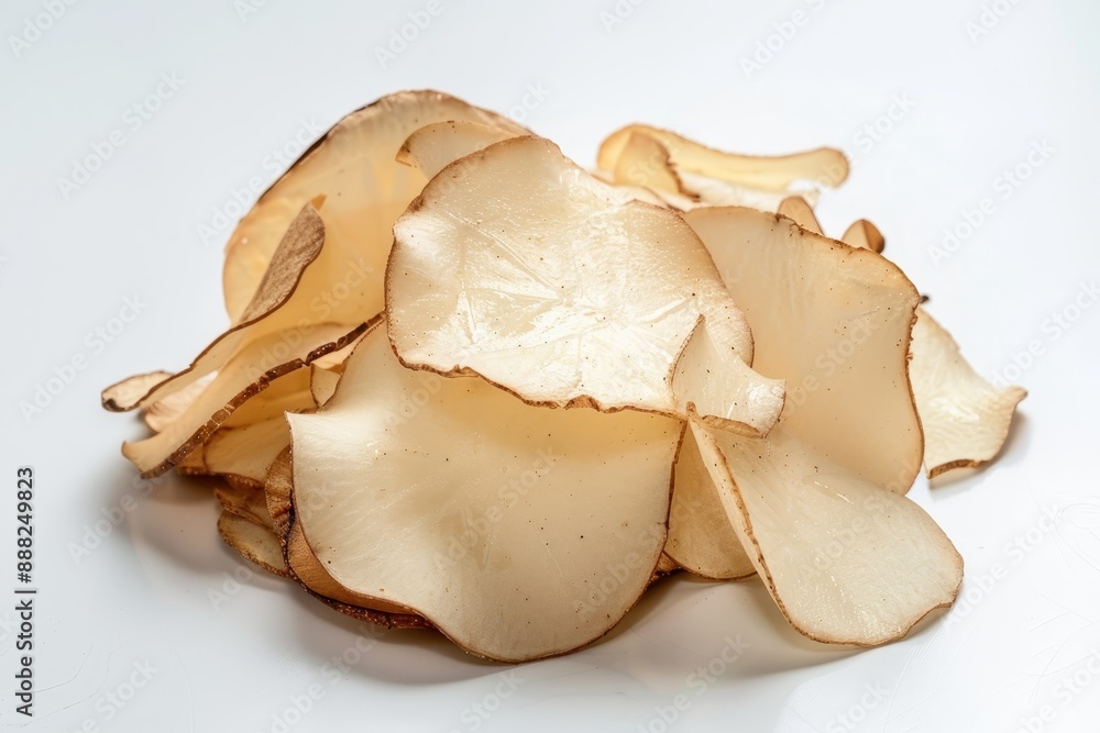 Cassava chips are Indonesian traditional snacks isolated on white background Cassava chips are Indonesian traditional snacks isolated on white background
