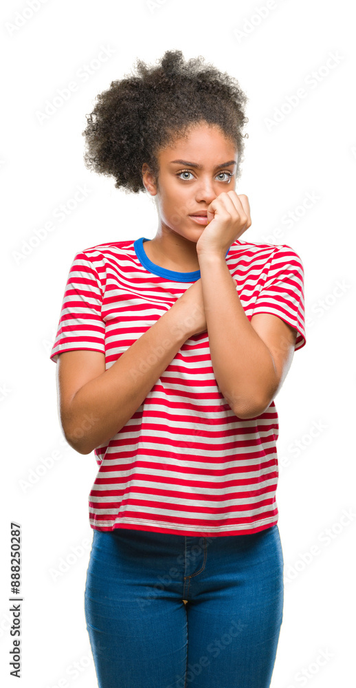 Young afro american woman over isolated background looking stressed and nervous with hands on mouth biting nails. Anxiety problem. Young afro american woman over isolated background looking stressed and nervous with hands on mouth biting nails. Anxiety problem.