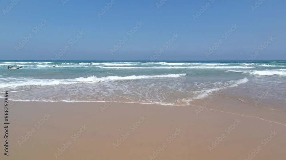 Tropical beach sea sand and sky. Landscape view of beach sea in summer day. Beach space area. At Israel Beach, Tel Aviv, Israel - July 17 2024. Video Clip. Sea shore Tropical beach sea sand and sky. Landscape view of beach sea in summer day. Beach space area. At Israel Beach, Tel Aviv, Israel - July 17 2024. Video Clip. Sea shore
