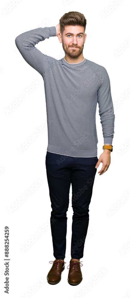 Young handsome man wearing stripes sweater confuse and wonder about question. Uncertain with doubt, thinking with hand on head. Pensive concept. Young handsome man wearing stripes sweater confuse and wonder about question. Uncertain with doubt, thinking with hand on head. Pensive concept.