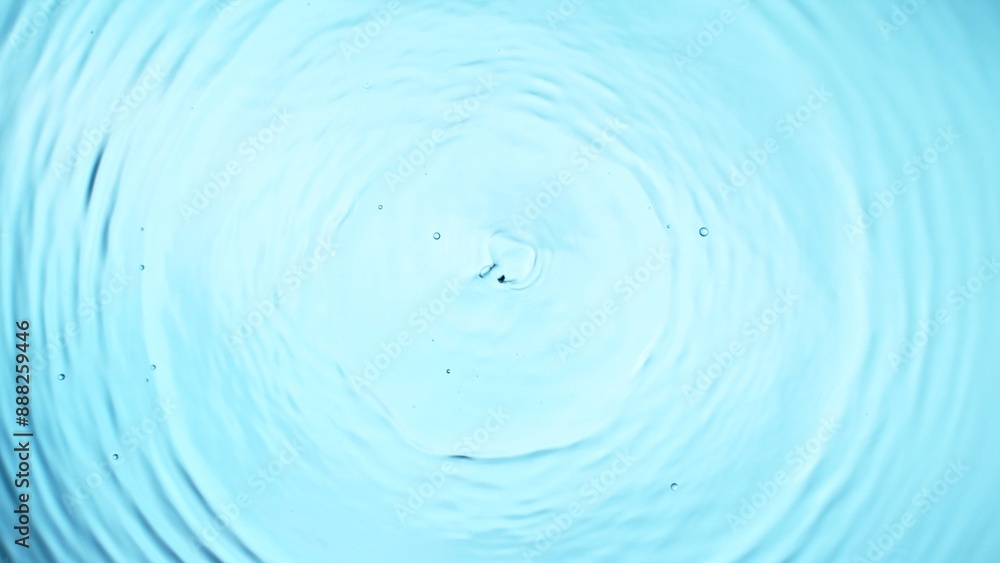 Top View of Water Circle Waves on Clear Blue Surface. Top View of Water Circle Waves on Clear Blue Surface.