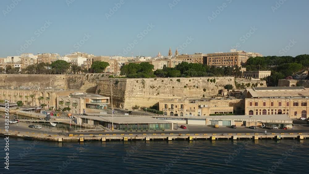A Majestic View of Valletta's Fortifications From the Grand Harbour. Valletta, the Capital City of Malta. The towering fortifications, built centuries ago. A Majestic View of Valletta's Fortifications From the Grand Harbour. Valletta, the Capital City of Malta. The towering fortifications, built centuries ago.