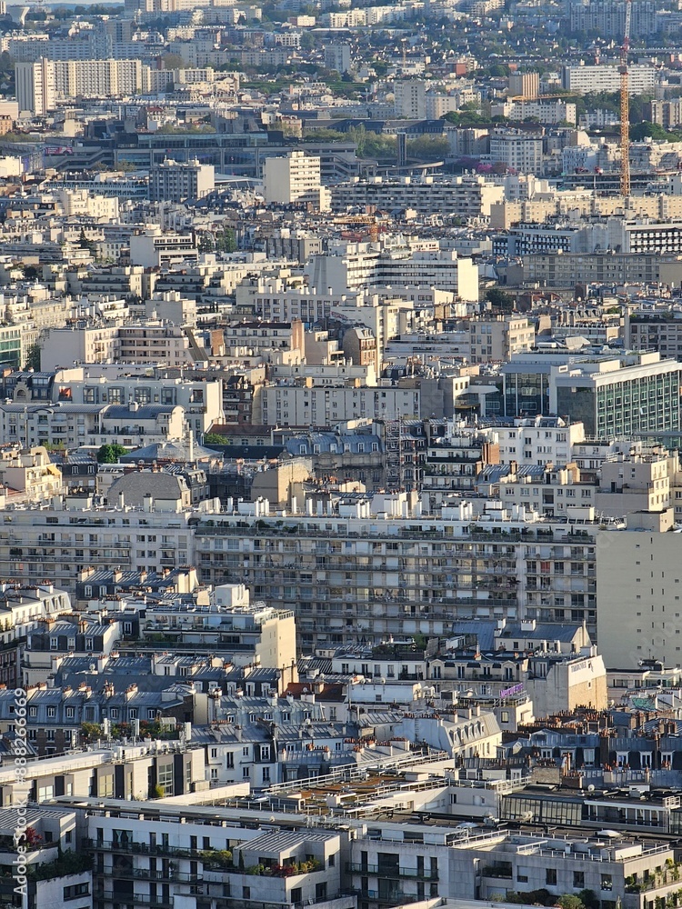 Paris, France - April 12, 2024: Aerial view of Paris skyline with dense urban sprawl and modern skyscrapers, Ile de France, France. Amazing mix between modern skyscraoers and old buildings. Paris, France - April 12, 2024: Aerial view of Paris skyline with dense urban sprawl and modern skyscrapers, Ile de France, France. Amazing mix between modern skyscraoers and old buildings.