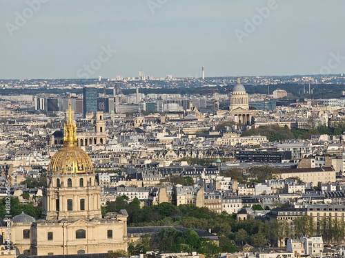 Paris, France - April 12, 2024: Aerial view of Paris skyline with dense urban sprawl and modern skyscrapers, Ile de France, France. Amazing mix between modern skyscraoers and old buildings.