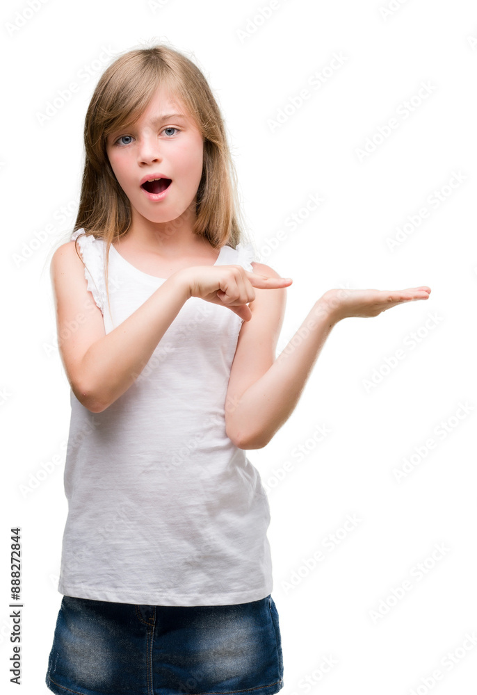 Young blonde toddler very happy pointing with hand and finger Young blonde toddler very happy pointing with hand and finger