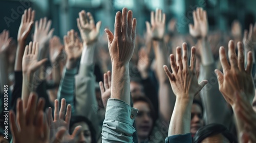 Hands of crowd in air in a vote event in a office room during an executive board meeting.