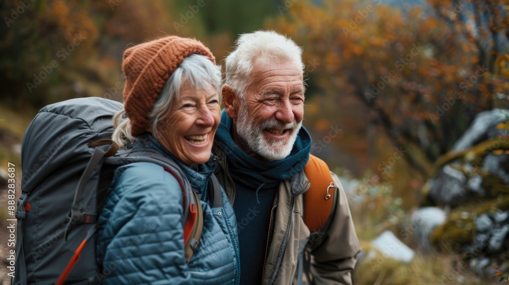 A smiling man and woman with backpacks pose for the camera, perfect for adventure travel themes A smiling man and woman with backpacks pose for the camera, perfect for adventure travel themes