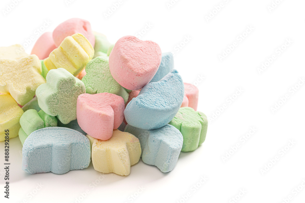 ColorfulCrunchy Freeze Dried Marshmallows Shaped like Lucky Charms Isolated on a White Background ColorfulCrunchy Freeze Dried Marshmallows Shaped like Lucky Charms Isolated on a White Background