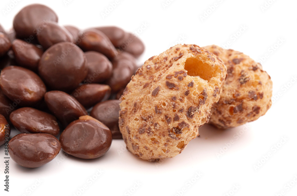 Crunchy Freeze Dried Milk Chocolate Covered Caramel Disks Isolated on White Background Crunchy Freeze Dried Milk Chocolate Covered Caramel Disks Isolated on White Background