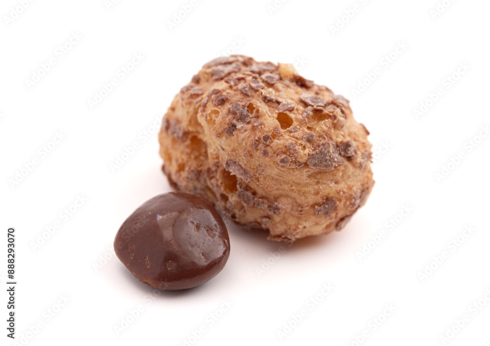 Crunchy Freeze Dried Milk Chocolate Covered Caramel Disks Isolated on White Background Crunchy Freeze Dried Milk Chocolate Covered Caramel Disks Isolated on White Background