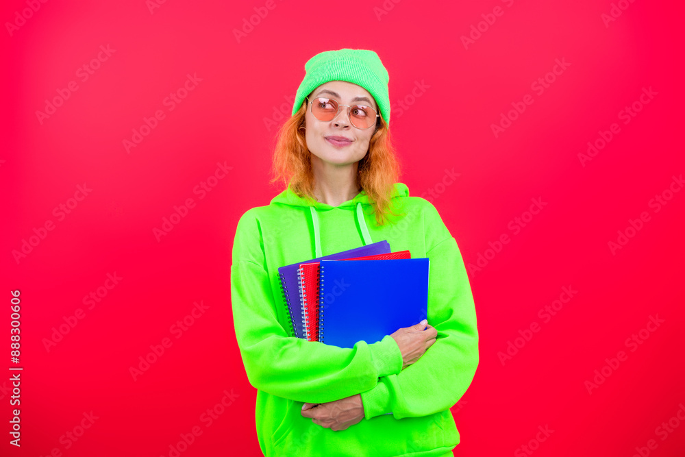 Girl student hold workbook. Back to school. Knowledge day. Education in college. Homework of girl isolated on pink. Knowledge and education. School education. Modern education Girl student hold workbook. Back to school. Knowledge day. Education in college. Homework of girl isolated on pink. Knowledge and education. School education. Modern education