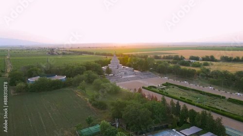 Aerial view of The Mausoleum of  Heroes of World War I from Marasesti, Romania. Photography was taken from a drone at a lower altitude at sunset, with the building in the view. photo