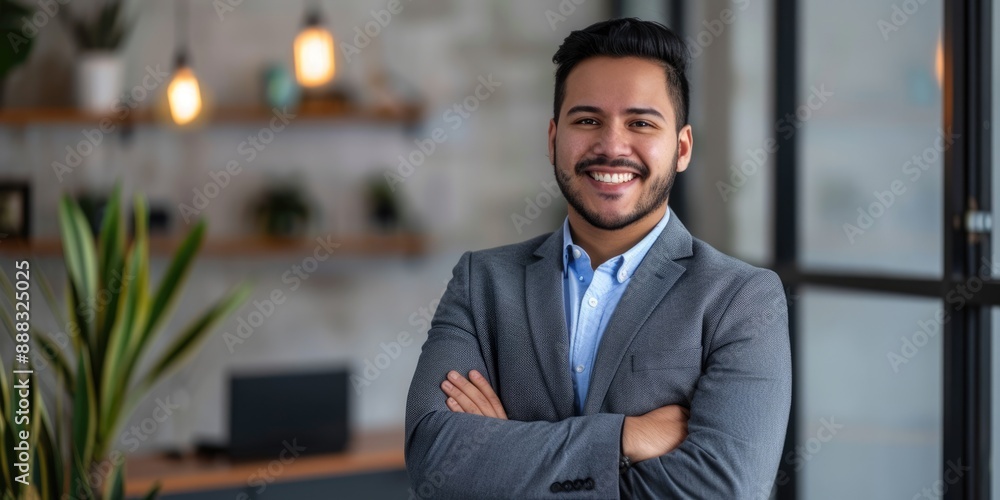 Fototapeta premium Young Latino Professional. Confident Hispanic Businessman with Copy Space in Office Portrait