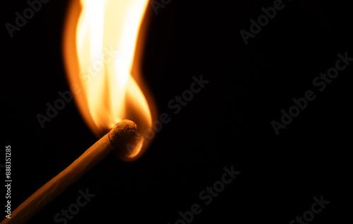 Matches and fire on a black background