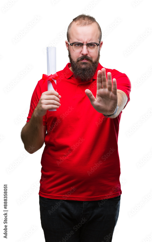 Young hipster man wearing glasses and holding degree over isolated background with open hand doing stop sign with serious and confident expression, defense gesture Young hipster man wearing glasses and holding degree over isolated background with open hand doing stop sign with serious and confident expression, defense gesture