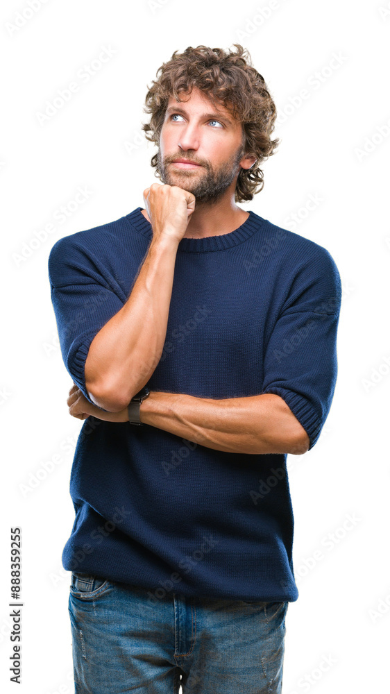 Handsome hispanic model man wearing winter sweater over isolated background with hand on chin thinking about question, pensive expression. Smiling with thoughtful face. Doubt concept. Handsome hispanic model man wearing winter sweater over isolated background with hand on chin thinking about question, pensive expression. Smiling with thoughtful face. Doubt concept.