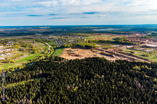 Aerial view of the sand pits behind the forest. Quarries in Potresovo, Kaluga region, Russia photo