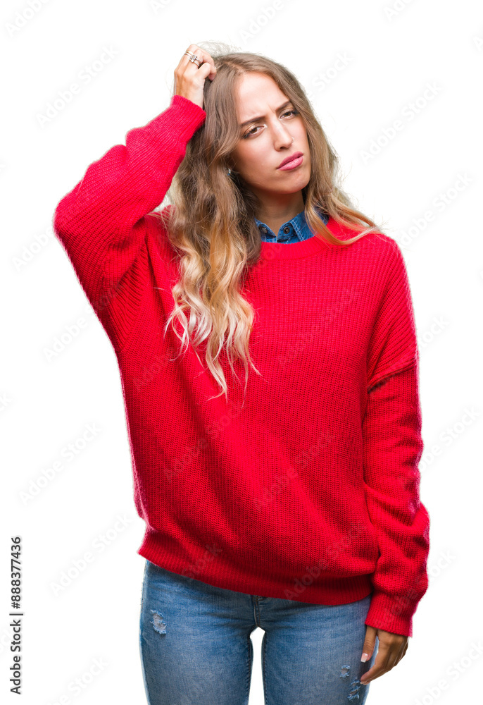 Beautiful young blonde woman wearing winter sweater over isolated background confuse and wonder about question. Uncertain with doubt, thinking with hand on head. Pensive concept. Beautiful young blonde woman wearing winter sweater over isolated background confuse and wonder about question. Uncertain with doubt, thinking with hand on head. Pensive concept.