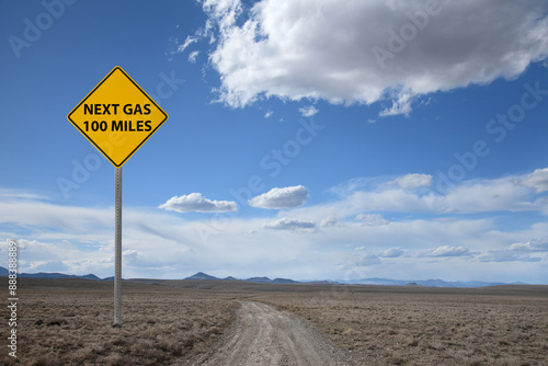 desert road sign next gas 100 miles