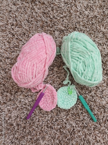 pink yarn and knitting needles