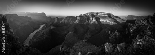 Beautiful panoramic sunset view of 3 rondawels in Sabie in South Africa.