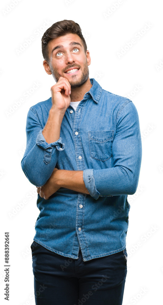 Young handsome man over isolated background with hand on chin thinking about question, pensive expression. Smiling with thoughtful face. Doubt concept. Young handsome man over isolated background with hand on chin thinking about question, pensive expression. Smiling with thoughtful face. Doubt concept.