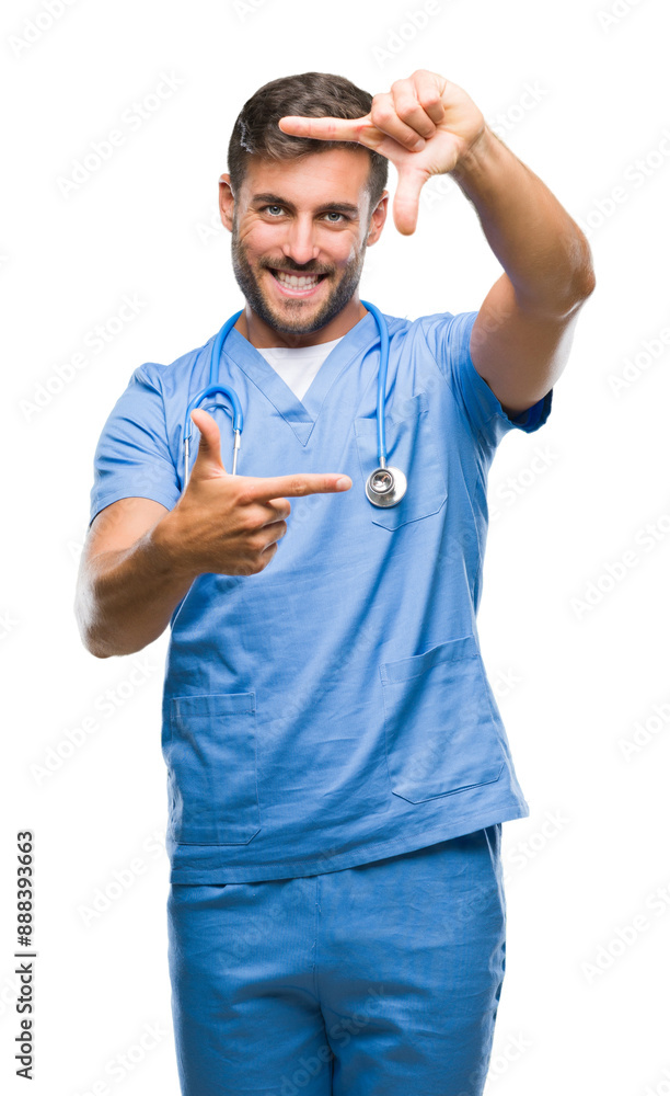 Young handsome doctor surgeon man over isolated background smiling making frame with hands and fingers with happy face. Creativity and photography concept. Young handsome doctor surgeon man over isolated background smiling making frame with hands and fingers with happy face. Creativity and photography concept.