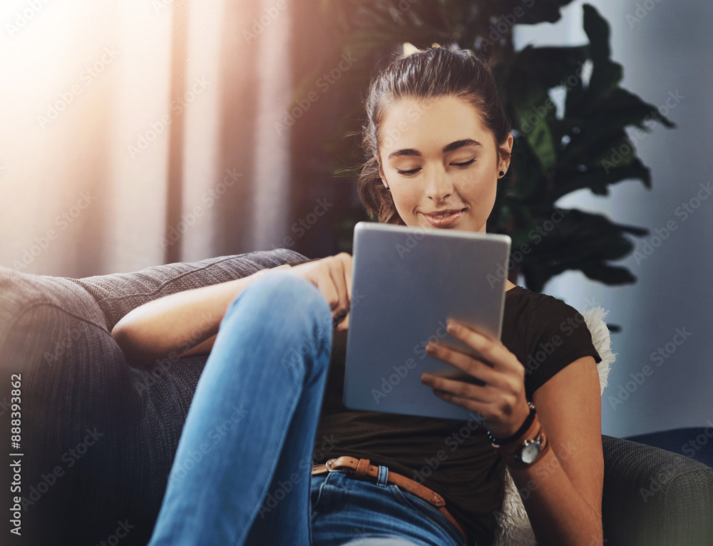 Relax, smile and woman with tablet on sofa for communication, network and reading ebook on app. Happy, female person and calm with tech for online story, download and digital literature at home Relax, smile and woman with tablet on sofa for communication, network and reading ebook on app. Happy, female person and calm with tech for online story, download and digital literature at home