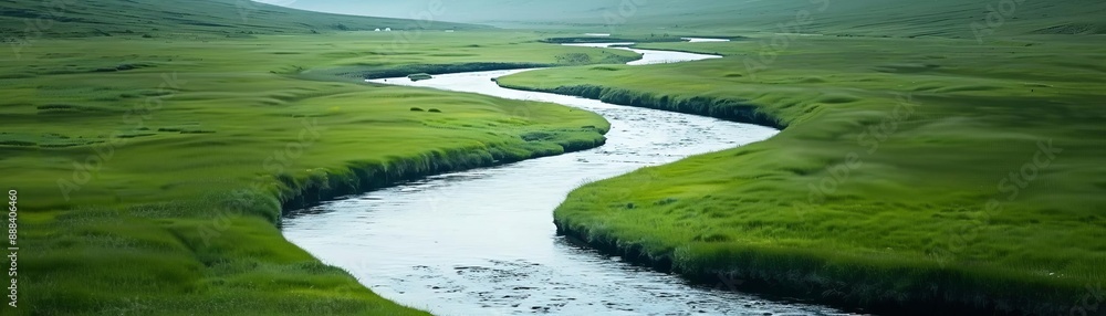 Serene landscape featuring a tranquil, winding river flowing through lush green meadows under a calm sky. Perfect for nature and relaxation themes. Serene landscape featuring a tranquil, winding river flowing through lush green meadows under a calm sky. Perfect for nature and relaxation themes.
