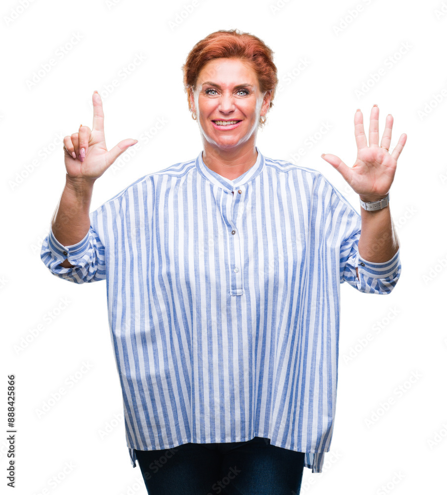 Atrractive senior caucasian redhead woman over isolated background showing and pointing up with fingers number seven while smiling confident and happy. Atrractive senior caucasian redhead woman over isolated background showing and pointing up with fingers number seven while smiling confident and happy.