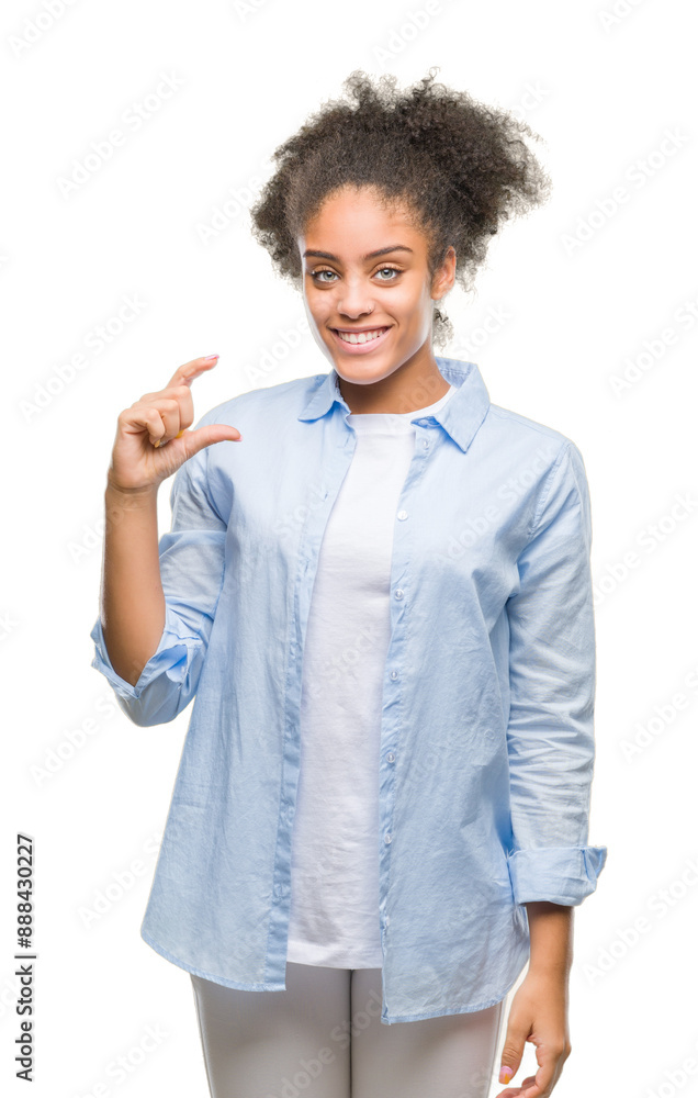 Young afro american woman over isolated background smiling and confident gesturing with hand doing size sign with fingers while looking and the camera. Measure concept. Young afro american woman over isolated background smiling and confident gesturing with hand doing size sign with fingers while looking and the camera. Measure concept.